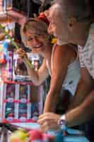 Free photo mid aged couple enjoying the game