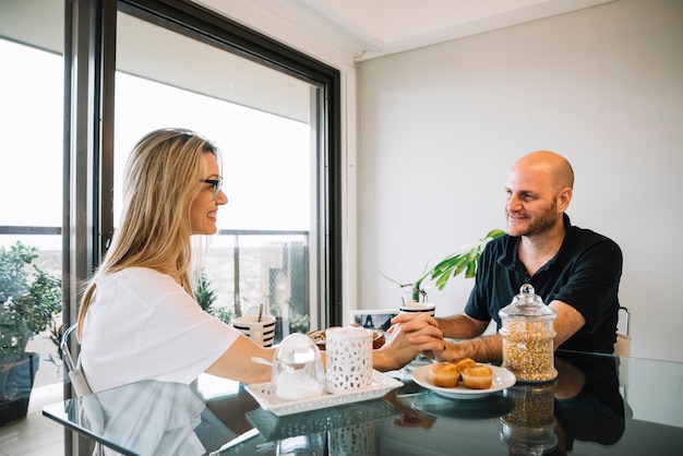 Mid aged couple in love at home