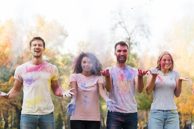 Free photo mid-air shot colored powder being thrown