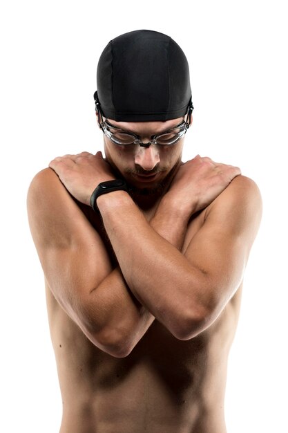 Mid shot swimmer hands to chest