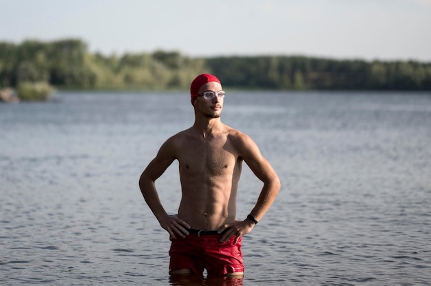 Free photo mid shot swimmer in lake