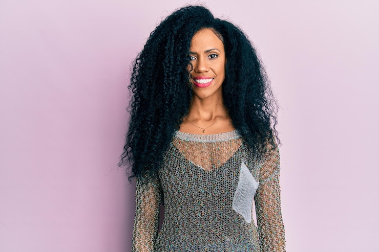 Free Photo middle age african american woman wearing casual clothes with a happy and cool smile on face. lucky person.