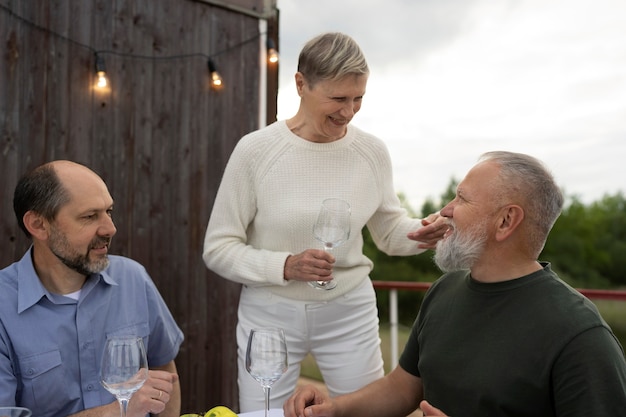 Middle age friends having fun at food festival