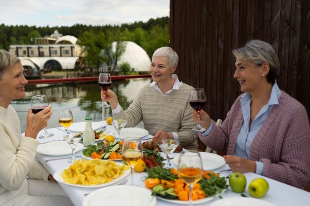 Middle age friends having fun at food festival