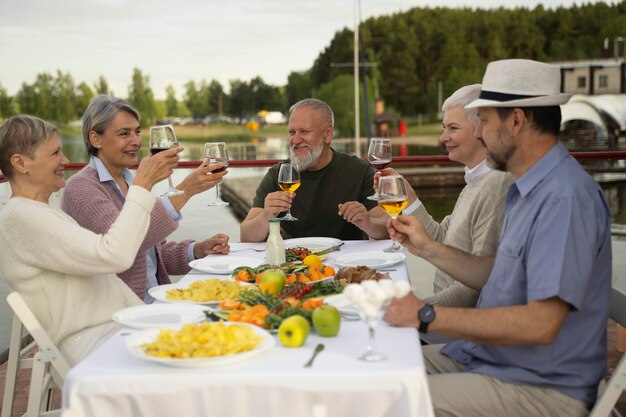 Middle age friends having fun at food festival