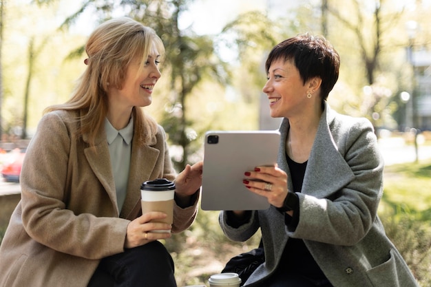 Free photo middle aged best friends spending time together