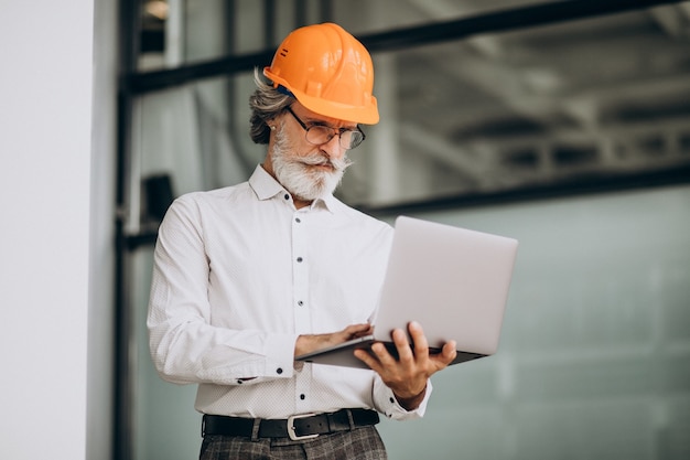 Middle aged business man in a hard hat