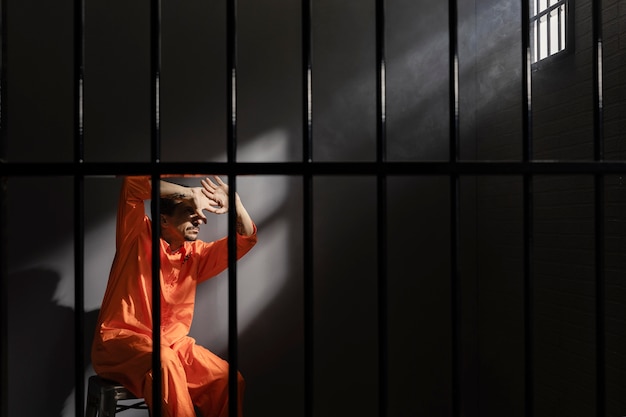 Middle aged man spending time in jail