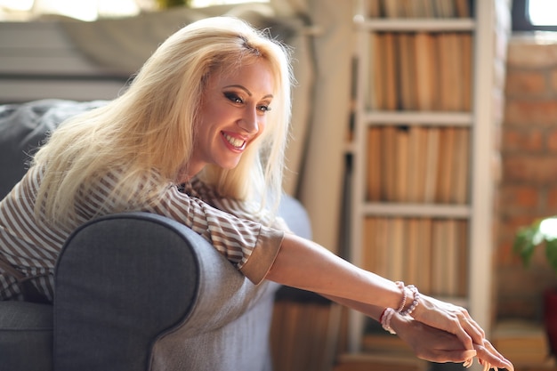 Free photo middle aged woman at home