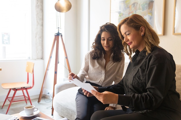 Middle aged woman meeting with notary