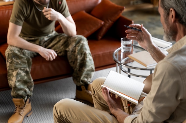 military man consulting with lawyer