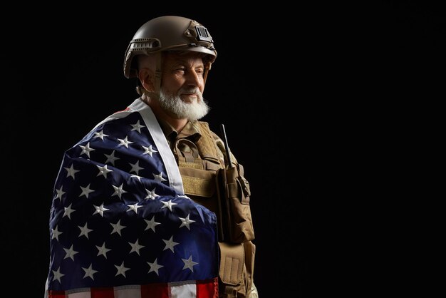 Military veteran with flag on shoulder