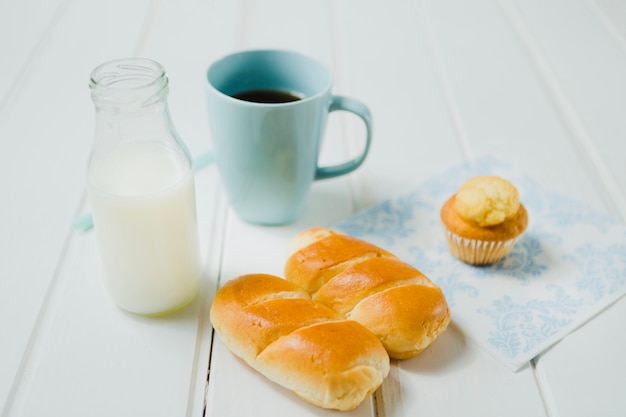 Milk and baked buns for snack
