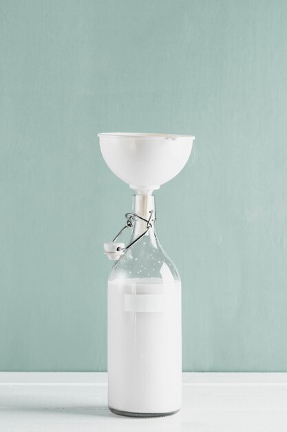 Milk bottle with funnel