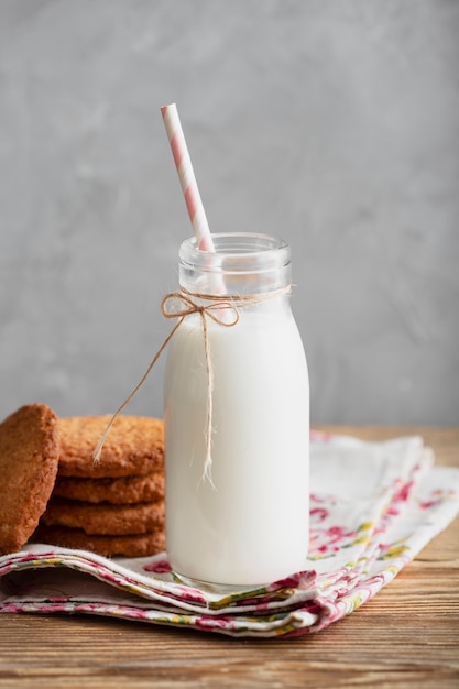 Milk in bottle with straw