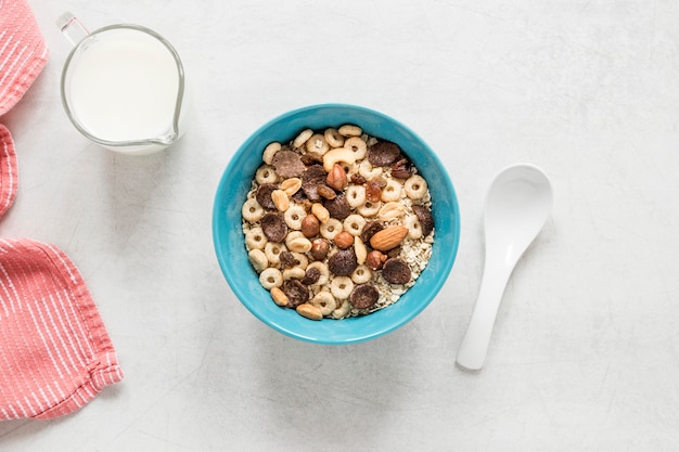 Milk and cereals on table