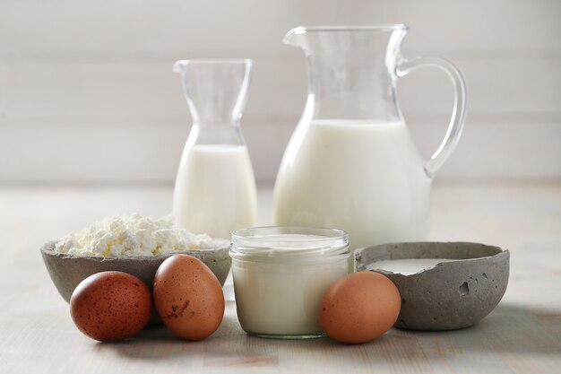 Milk products on wooden table