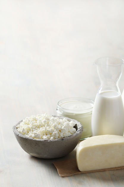 Milk products on wooden table