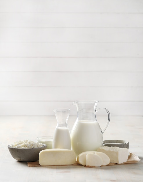 Milk products on wooden table