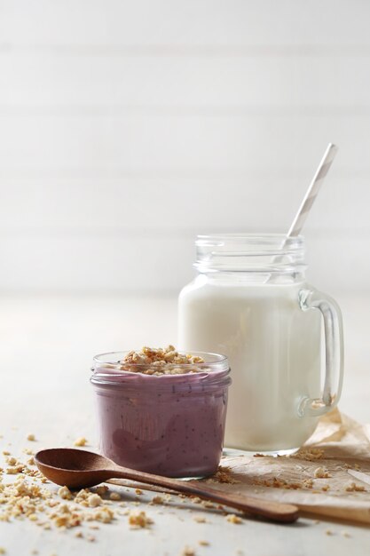 Milk products on wooden table