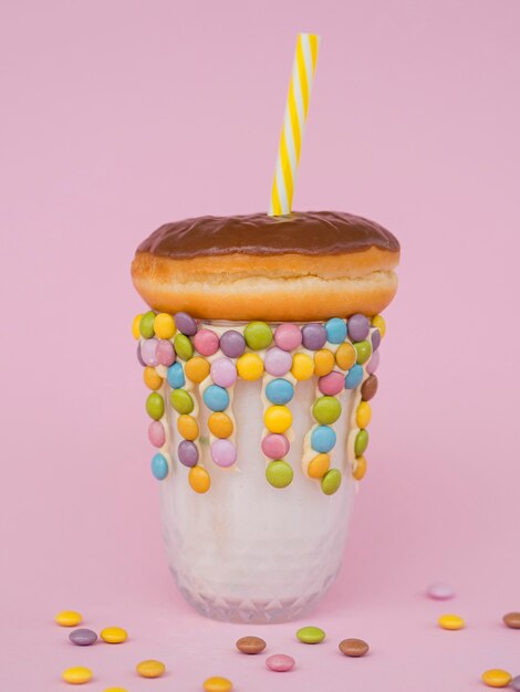 Milkshake glass with donut