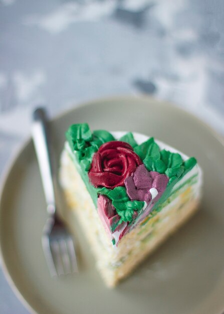 Milky girl cake slice decorated green leaves and lily flowers, cake decorated as flower bouquet, spring cake decor