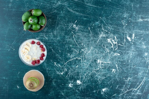 Milky smoothie with fruits and berries aside. High quality photo