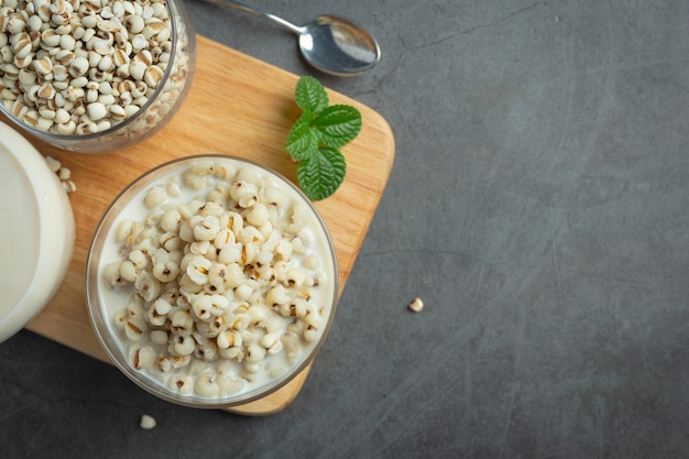 Millet coconut milk dessert in glass bowl