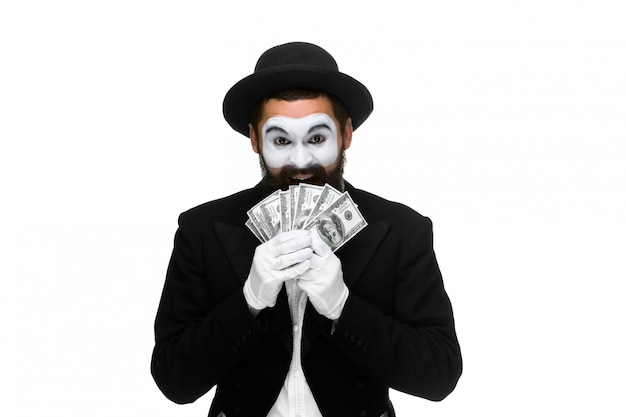 Mime as a businessman holding dollar bills