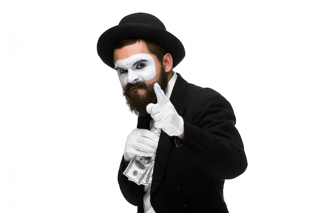 mime as businessman putting money in his pocket