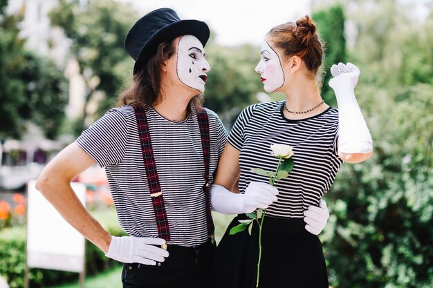 Mime couple looking at each other