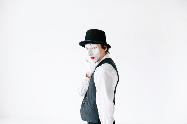 Mime flirts sending an air kiss