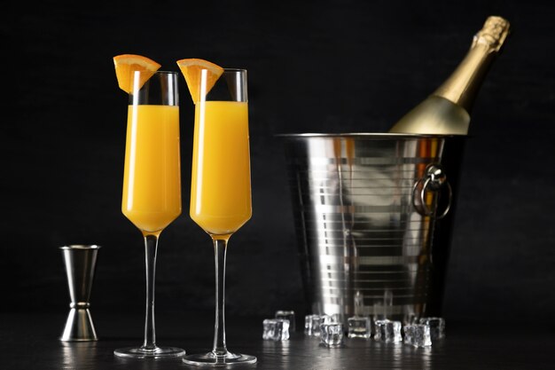 Mimosa cocktail glasses with orange slices
