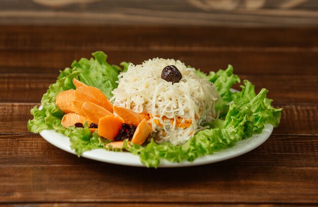 Mimosa salad with chopped parmesan on the top