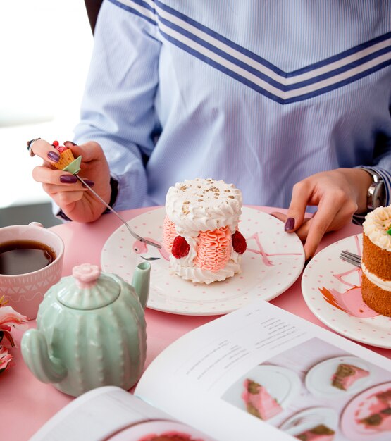 Mini creamy cake roulet on the table