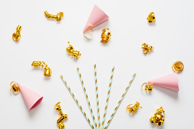 Mini party hats with golden ribbons