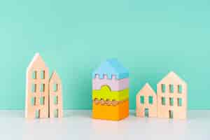 Free photo miniature houses on blue background