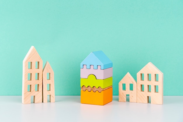 miniature houses on blue background