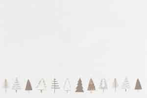 Бесплатное фото Минимальная золотая рождественская елка в социальных сетях баннер фон с пространством для текста