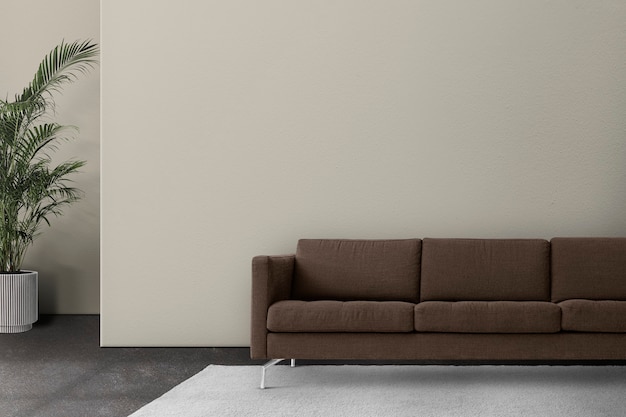 茶色のソファと最小限のリビングルームのインテリアデザイン