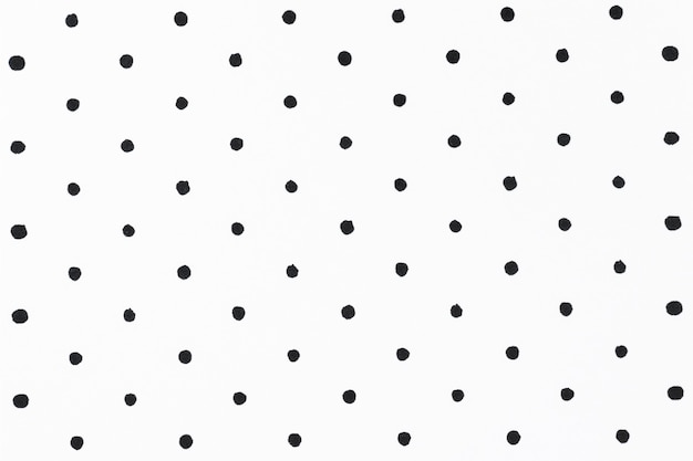 블랙 폴카 도트 패턴으로 최소한의 흰색 배경