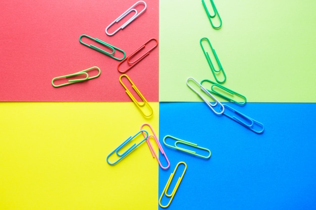 Minimal work space - Creative flat lay photo of workspace desk with paperclips on copy space pastel background. Top view , flat lay photography.