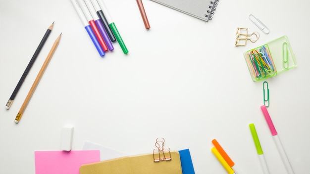 Minimal work space - Creative flat lay photo of workspace desk with sketchbook and wooden pencil on copy space white background. Top view , flat lay photography.