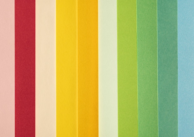 Free photo minimalist abstract colored small pieces of paper