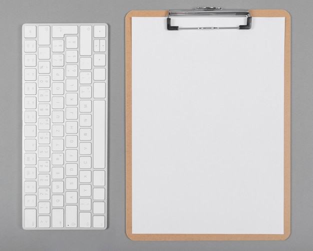 Minimalist arrangement with empty clipboard