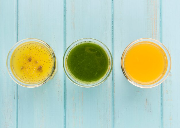 Minimalist assortment of fresh smoothies flat lay