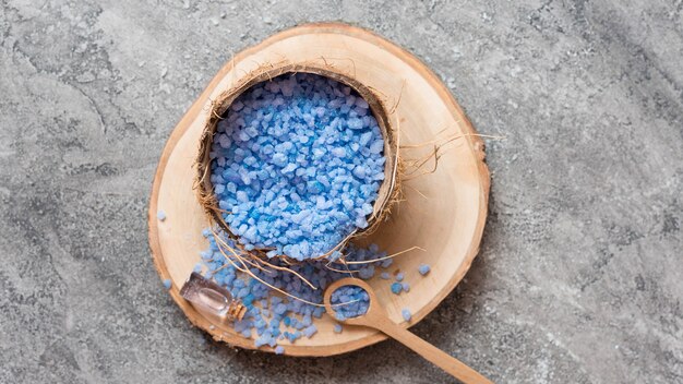 Minimalist bath salt spa concept on wooden board