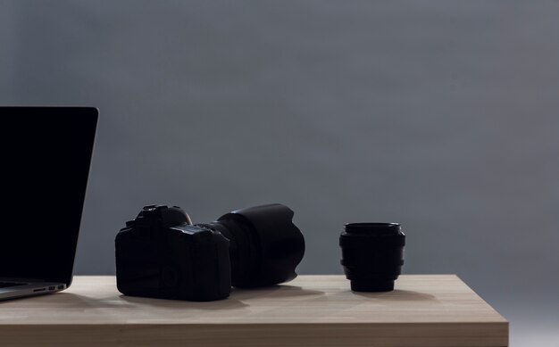 Minimalist camera lens on desk with copy space