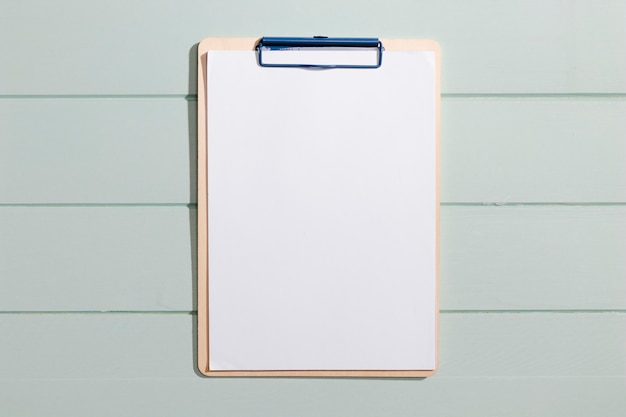 Free photo minimalist copy space clipboard top view