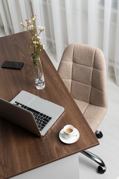 Free photo minimalist desk arrangement and chair